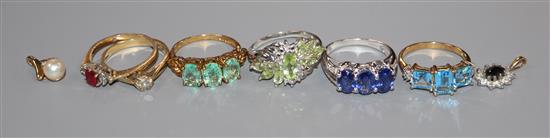 Six assorted modern 9ct gold and gem set dress rings and two small pendants.